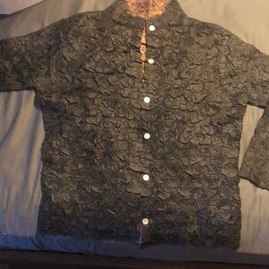 A reversible black to brown lightweight dress jacket